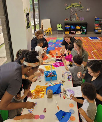 Our therapy team with children